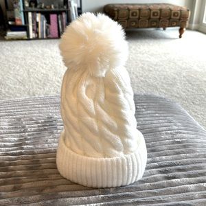 Winter knitted hat with soft lining. Gentle wash and dry. New w/o tags.